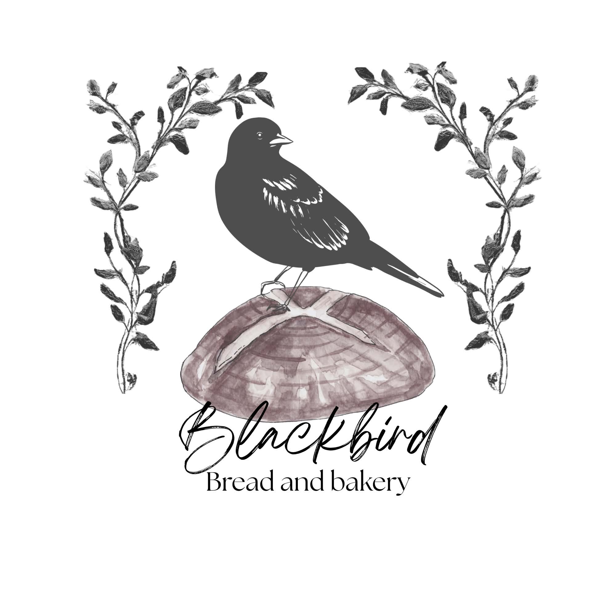 Blackbird perched on a rustic loaf, framed by hand-drawn branches